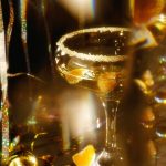 Golden, Celebratory Cocktail with Fruit